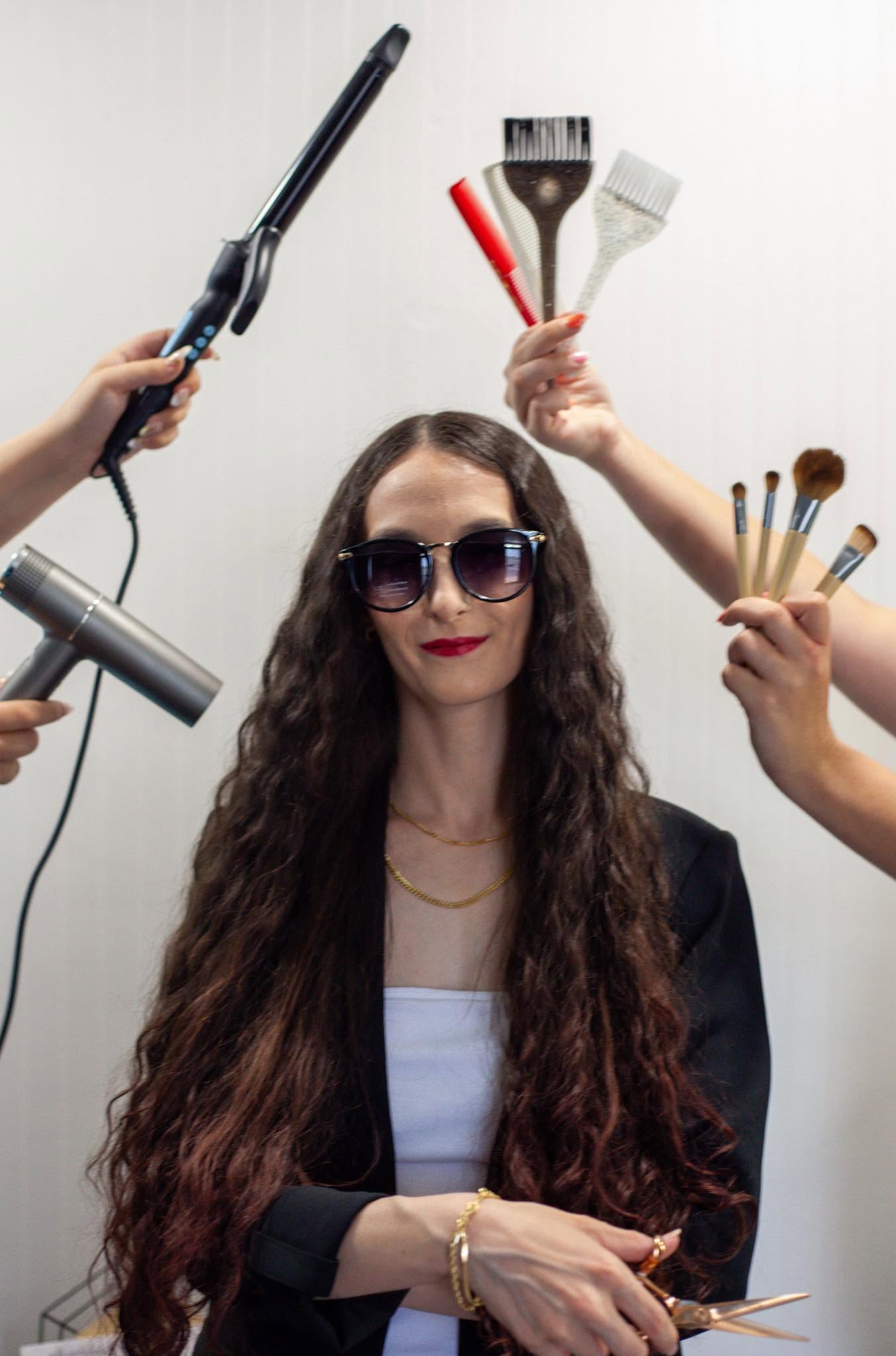 Kaitlyn, owner of Knockout Beauty, with salon tools